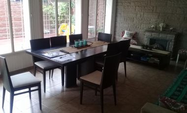 EXCELENTE PH DE 3 AMBIENTES CON FONDO Y QUINCHO,CON GARAGE CUBIERTO,