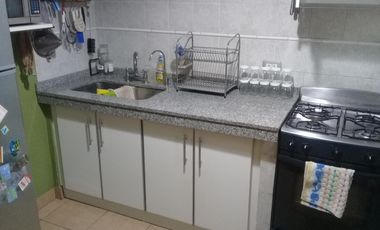 EXCELENTE PH DE 3 AMBIENTES CON FONDO Y QUINCHO,CON GARAGE CUBIERTO,