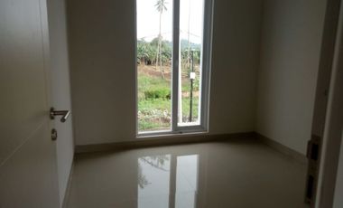 RUMAH 2 LT DEKAT BANDARA SAMRATULANGI TEPI JALAN UTAMA
