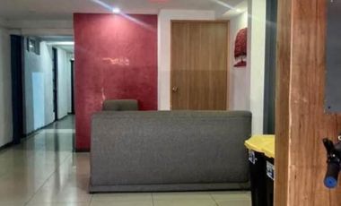 Venta de edificio con cuartos amueblados