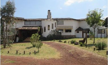 Casa con funcionamiento de hotel