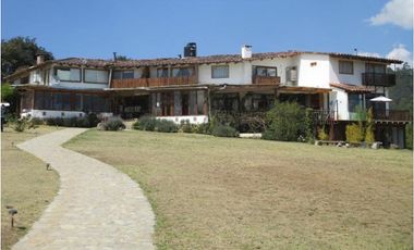 Casa con funcionamiento de hotel