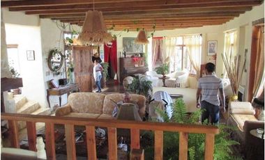 Casa con funcionamiento de hotel