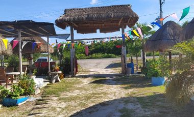 Se vende quinta con piscina y paneles solares sobre carretera Chelem-Chuburná