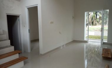 RUMAH 2 LT DP 10% BEBAS BANJIR DEKAT BANDARA SAMRATULANGI