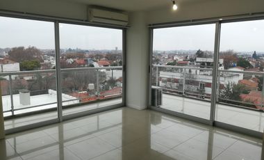 EXCELENTE DEPARTAMENTO 3 AMB CON COCHERA CUBIERTA , EDIFICO SYRAH , IMPECABLE , AV. CENTENARIO 2360