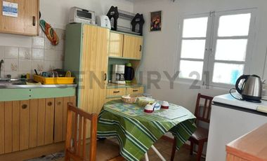 Casa con local comercial