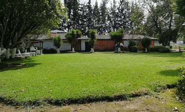 VENTA TERRENO COMERCIAL CAYAMBE, 10819M2 FRENTE A LA PANA NORTE