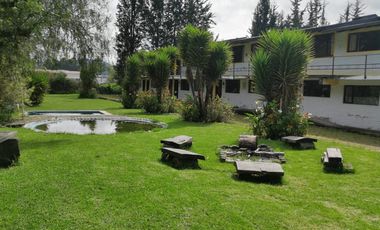 VENTA TERRENO COMERCIAL CAYAMBE, 10819M2 FRENTE A LA PANA NORTE