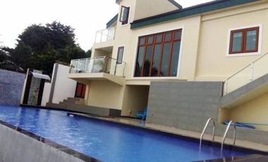 Beach House for sale in Compostela, Cebu with swimming pool