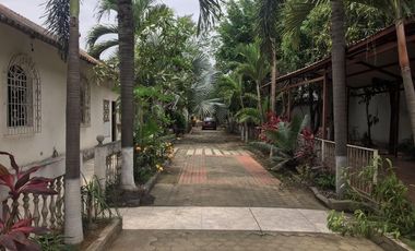 VENDO TERRENO RELLENADO AL PIE DE LA CARRETERA EN VIA SAMBORONDON