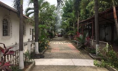 VENDO TERRENO RELLENADO AL PIE DE LA CARRETERA EN VIA SAMBORONDON