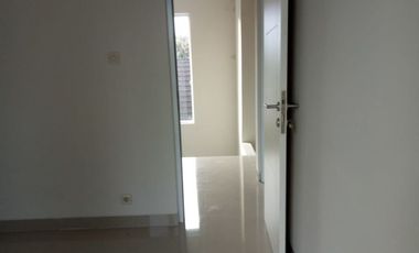 RUMAH CANTIK BEBAS BANJIR 6 MENIT DARI BANDARA SAMRATULANGI