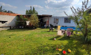 VENTA DE CASA 3 AMBIENTES SOBRE LOTE DE 315 M² - LUIS GUILLÓN - FONDO LIBRE - A MTS DE AV. BRUZONE - POSIBILIDAD DE PERMUTA