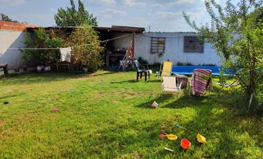 VENTA DE CASA 3 AMBIENTES SOBRE LOTE DE 315 M² - LUIS GUILLÓN - FONDO LIBRE - A MTS DE AV. BRUZONE - POSIBILIDAD DE PERMUTA