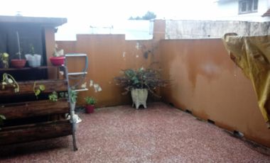 VIVIENDA EN P.A. CON  GALPÓN / DEPÓSITO EN P.B.