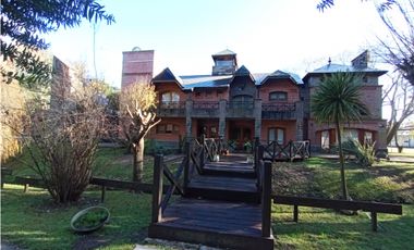 Chacra con importante chalet  -  ubicado en Ruta 11 Km 323