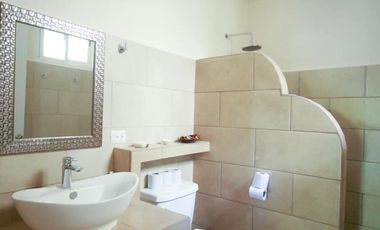 Hotel en operación, a unos minutos de la playa, en venta Playa del Carmen.