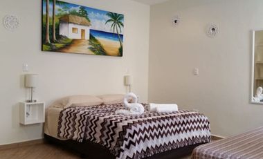 Hotel en operación, a unos minutos de la playa, en venta Playa del Carmen.