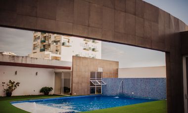 Depa de 3 recamaras con 3 baños completos climatizados y amueblado cuenta con alberca, vista al mar y a la isla de sacrificios en el piso 4.de a 128 m2 y 7:30 mts de frente al boulevard Manuel Ávila Camacho .