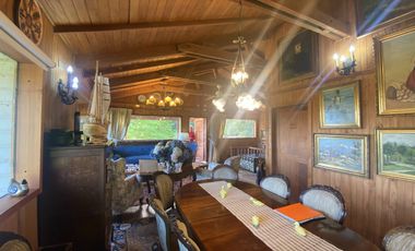 Terreno con borde rio y casa vista al lago