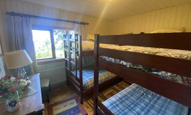 Terreno con borde rio y casa vista al lago