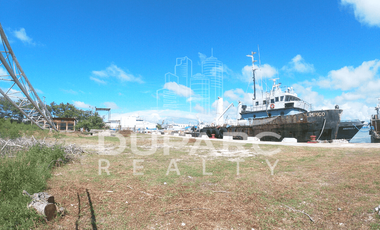 Propiedad 9542.23 m2  en Puerto Industrial con Patio, Oficinas y Bodega en Renta