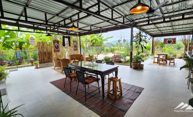Gardener's Paradise with Mountain Views and Bali-Style Outdoor Living Spaces