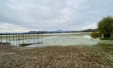 SE VENDE TERRENO CON CASA LAGO RAPEL 8400MTRS