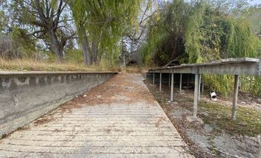 SE VENDE TERRENO CON CASA LAGO RAPEL 8400MTRS