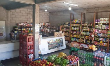 PROPIEDAD EN LOTE PROPIO CON LOCAL COMERCIAL, 6 DEPARTAMENTOS DE 2 AMBIENTES Y ENTRADA PARA AUTOS.