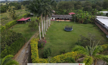 Lote con casa en venta via al Caimo