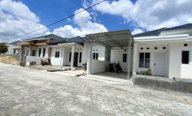 RUMAH CLUSTER BONUS CANOPI DI JALAN DELIMA