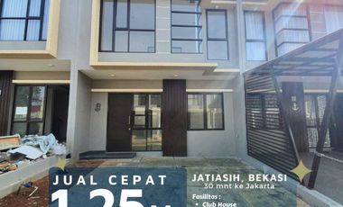 Jual cepat dibawah harga normal townhouse dg clubhouse