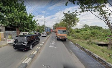 Tanah di nol jalan raya besar KRIAN luas 6750 m 2 jt/m cocok untuk gudang, pabrik, garasi, atau tempat hiburan rakyat