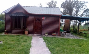 EXCELENTE PROPIEDAD DOS LOTES TERRENOS CON VIVIENDA DE TRES AMBIENTES EN BUENAS CONDICIONES