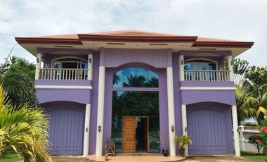 BIG PRICE REDUCED! LUXURIOUS BEACH HOME FRONTING APO ISLAND!!