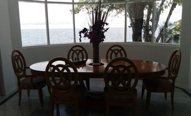 BIG PRICE REDUCED! LUXURIOUS BEACH HOME FRONTING APO ISLAND!!