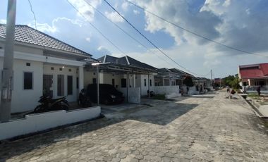 perumahan cluster pinggir jalan delima