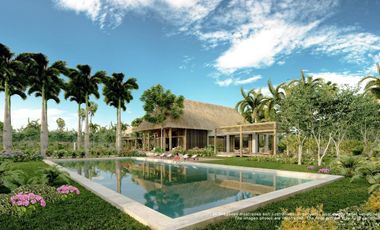 Terreno residencial en comunidad tropical en venta