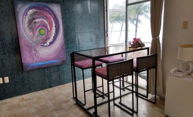 Frente al mar y la playa departamento con alberca una recamara .