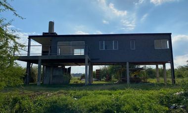 CASA A ESTRENAR FRENTE AL RIO  AL LADO DE COUNTRY SOLARES DE PAUCKE. AUTOPISTA SANTA FE -ROSARIO