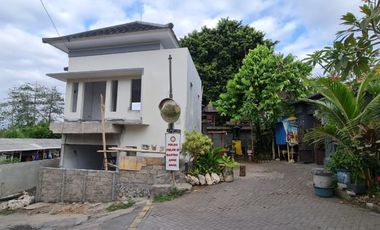 RUMAH MURAH SEMI VILLA 2 LANTAI MINIMALIS TYPE 106/100 3 MENIT DARI GARUDA WISNU KENCANA