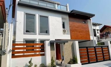 5 Bedrooms house and lot for sale in Greenwoods Exe. village