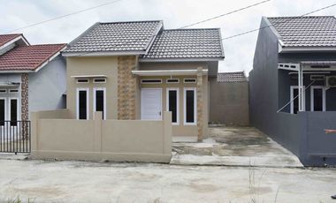 RUMAH SIAP HUNI LOKASI DILINGKUNGAN CLUSTER DI JL PESANTREN BUKIT BARISAN HARAPAN RAYA