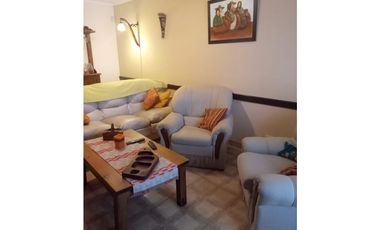 casa de tres dormitorios