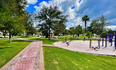 SURPONIENTE EN JARDINES DEL LAGO DE UNA PLANTA