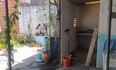 Vendo terreno 10 x 20m. Con vivienda en Merlo