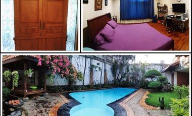 Rumah Dijual terawat bagus dan mewah ornamen kayu jati ada kolam renang halaman luas di pusat kota
