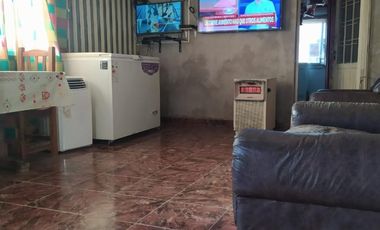 Merlo  lote de 10x27,50 con dos casas, precio total:  U$S 90.000
